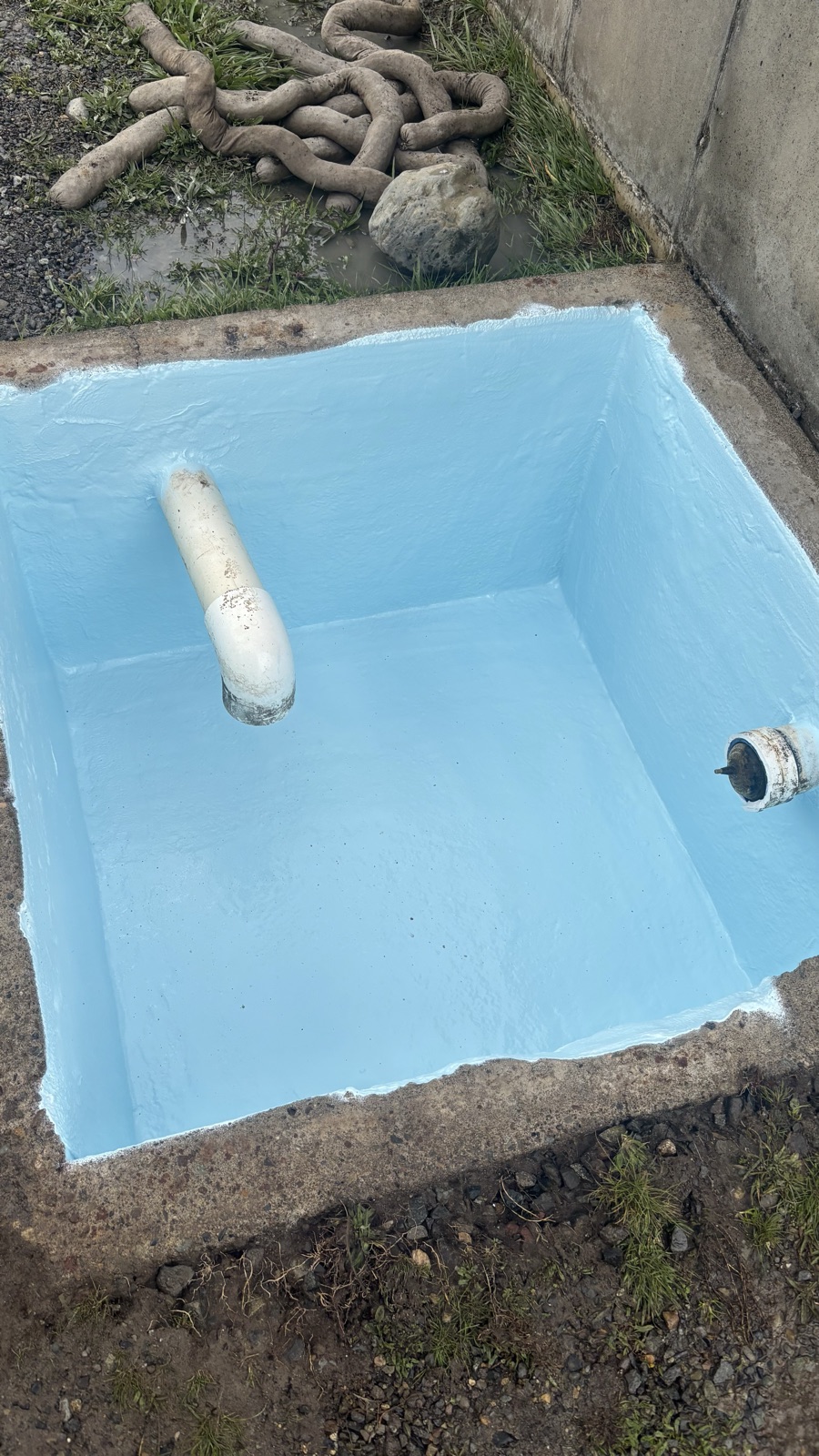 Small coated concrete vault