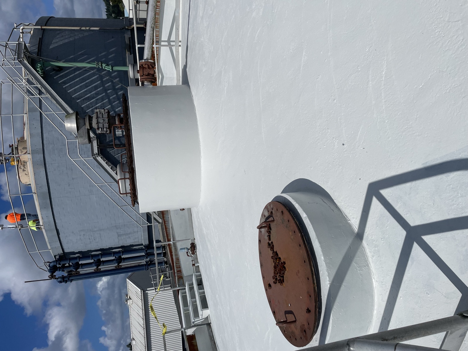 Coated tank roof and access hatch